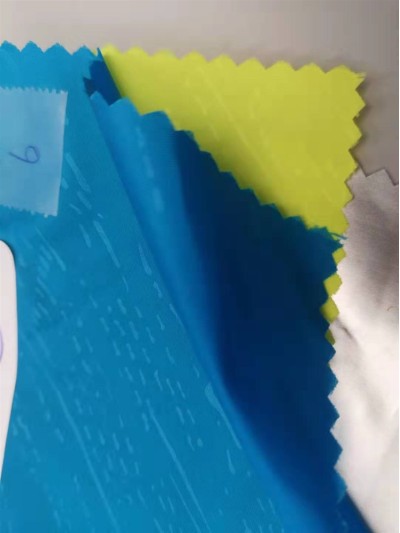 HK-HGCG 965-1 DYED 100％ POLYESTER WIHT EMBOSSED WOVEN 58'/59' 70GM2 正面照